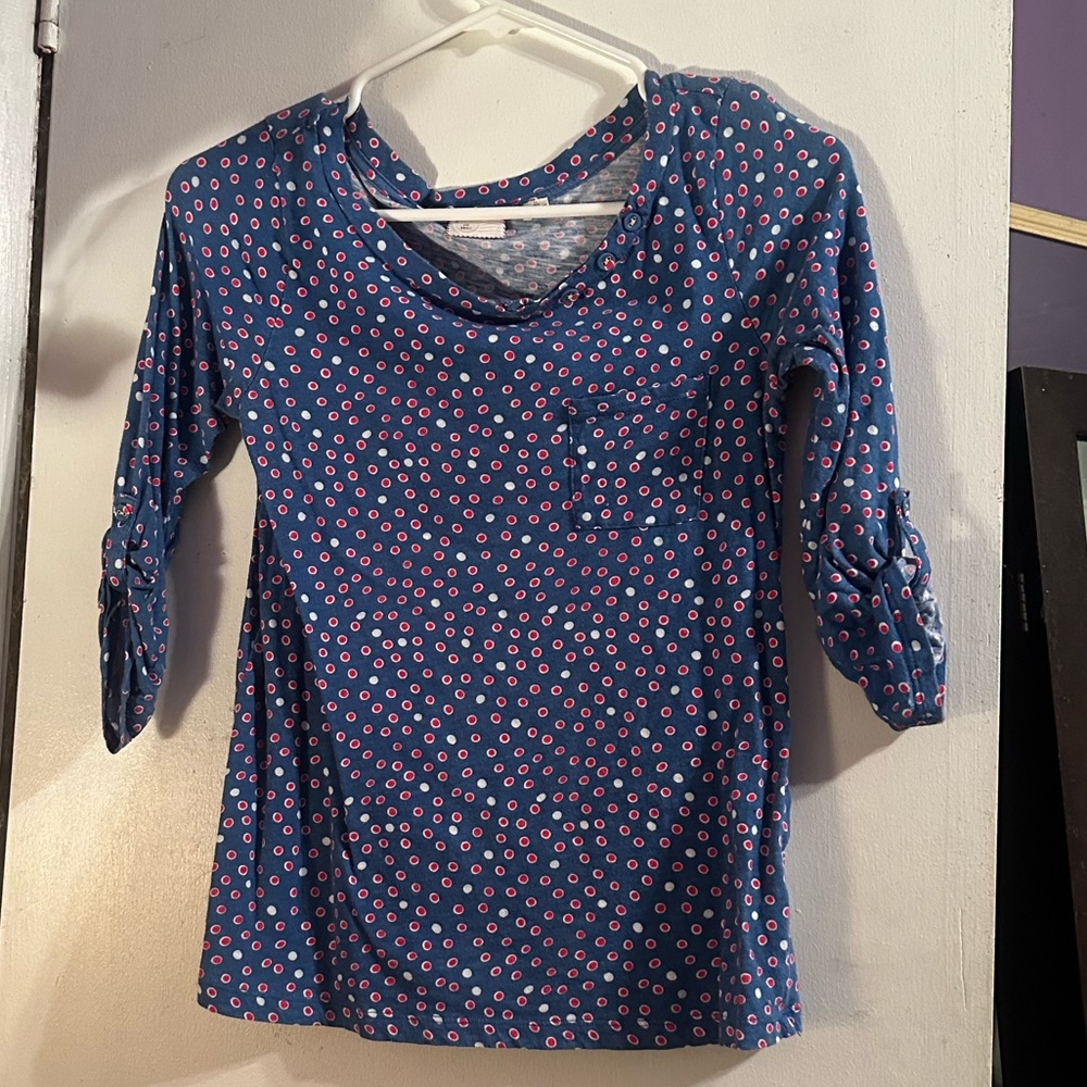 Anthropologie blue dot top Small roll sleeves